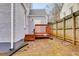 Cozy deck located off the back of the house with an adjacent privacy fence at 1318 Beecher St, Atlanta, GA 30310