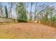 Large, fenced backyard offering ample space for outdoor activities at 1318 Beecher St, Atlanta, GA 30310