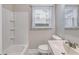 Bright bathroom featuring a shower/tub and a window offering lots of natural light at 1318 Beecher St, Atlanta, GA 30310