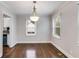 Dining area featuring hardwood floors, neutral paint and natural light at 1318 Beecher St, Atlanta, GA 30310