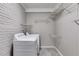 Functional laundry room with full-size washer and dryer, offering convenience and ample storage at 1318 Beecher St, Atlanta, GA 30310