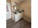 Bright bathroom with a large mirror and white cabinets at 1631 Royal Ives Dr, Lawrenceville, GA 30045