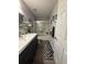 Bathroom featuring a granite countertop vanity and shower at 1631 Royal Ives Dr, Lawrenceville, GA 30045