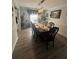 Elegant dining room featuring a large table set for a formal dinner at 1631 Royal Ives Dr, Lawrenceville, GA 30045