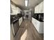 Spacious kitchen featuring ample counter space and stainless steel appliances at 1631 Royal Ives Dr, Lawrenceville, GA 30045