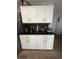 Well-equipped kitchen with modern appliances and ample cabinet space at 1631 Royal Ives Dr, Lawrenceville, GA 30045