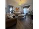 Comfortable living room with ample seating and elegant decor at 1631 Royal Ives Dr, Lawrenceville, GA 30045