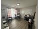 Functional office space with a large desk and whiteboard for productivity at 1631 Royal Ives Dr, Lawrenceville, GA 30045