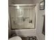 Shower stall with sliding doors at 1631 Royal Ives Dr, Lawrenceville, GA 30045