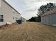 A generous yard space featuring a storage shed for your convenience at 1631 Royal Ives Dr, Lawrenceville, GA 30045