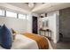 Bright bedroom boasts modern decor, concrete accents and lots of natural light for a comfortable retreat at 480 John Wesley Dobbs Ne Ave # 810, Atlanta, GA 30312
