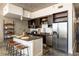 Well-equipped kitchen with a spacious island, stainless steel refrigerator, and open shelving at 480 John Wesley Dobbs Ne Ave # 810, Atlanta, GA 30312