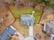 Aerial view of a home with a driveway and fenced-in backyard at 1021 Adah Ln, Lawrenceville, GA 30043