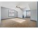 Large bedroom with a sloped ceiling, ceiling fan, and dual windows offering abundant light at 1021 Adah Ln, Lawrenceville, GA 30043