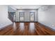 Hardwood floors and natural light fill this cozy living space at 1021 Adah Ln, Lawrenceville, GA 30043