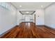 Spacious living room with beautiful hardwood floors and gray accent trim at 1021 Adah Ln, Lawrenceville, GA 30043