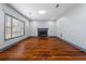 Spacious living room with hardwood floors and a fireplace at 1021 Adah Ln, Lawrenceville, GA 30043