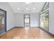 Bright sun room offers tile floors, gray accent trim and lots of natural light at 1021 Adah Ln, Lawrenceville, GA 30043