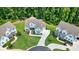 Aerial view of a neighborhood featuring luxurious houses and landscaping at 2861 Digna Ct, Acworth, GA 30101