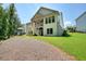 Home exterior with a large backyard, lush lawn and wooded surroundings at 2861 Digna Ct, Acworth, GA 30101