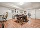 Finished basement featuring laminate flooring, a game table, and a comfortable workspace at 2861 Digna Ct, Acworth, GA 30101