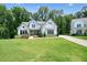 Charming two-story home with manicured lawn and beautiful landscaping in a tranquil neighborhood at 2861 Digna Ct, Acworth, GA 30101