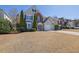 Inviting two-story home with a well-manicured lawn and mature trees at 3624 Bancroft Main Nw, Kennesaw, GA 30144