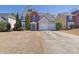 Charming two-story home with brick accents and a two-car garage at 3624 Bancroft Main Nw, Kennesaw, GA 30144
