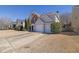 Traditional home with a two-car garage and ample driveway parking at 3624 Bancroft Main Nw, Kennesaw, GA 30144