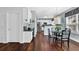 Eat-in kitchen featuring a glass table and modern stainless steel appliances at 3624 Bancroft Main Nw, Kennesaw, GA 30144