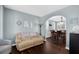 Cozy living room features hardwood floors and a transitional sofa and armchair at 3624 Bancroft Main Nw, Kennesaw, GA 30144