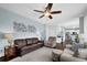 Open-concept living room featuring hardwood floors, and comfortable couches at 3624 Bancroft Main Nw, Kennesaw, GA 30144