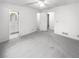 Spacious bedroom offering access to the bathroom, with a ceiling fan enhancing comfort at 4726 Alpine Sw Dr, Lilburn, GA 30047