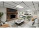 The basement offers a brick fireplace, recessed lighting, and a nearby kitchenette at 3284 Devaughn Ne Dr, Marietta, GA 30066