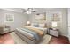 Cozy bedroom with a queen bed, neutral decor, and natural light at 3284 Devaughn Ne Dr, Marietta, GA 30066