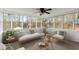 Bright sunroom with many windows, comfortable seating, and natural light at 3284 Devaughn Ne Dr, Marietta, GA 30066