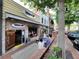 A lively restaurant with outdoor seating, a brick exterior, and a welcoming atmosphere at 2008 Cottonwood Ln, Woodstock, GA 30188