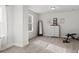 Bright room with neutral walls, a large window and minimalist decor, perfect for a home gym or additional living space at 242 Crestbrook Ln, Dallas, GA 30157