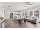 Spacious living room open to the kitchen with hardwood floors and lots of natural light at 242 Crestbrook Ln, Dallas, GA 30157