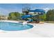 Resort-style pool with a thrilling water slide for endless summer fun at 242 Crestbrook Ln, Dallas, GA 30157