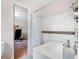Bathroom featuring a shower/tub combination, and neutral walls at 3319 Colony Dr, Conyers, GA 30013