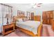 Bedroom featuring wood furnishings, carpet, and ceiling fan at 3319 Colony Dr, Conyers, GA 30013