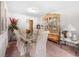 An elegant dining room with decorative furniture and natural light at 3319 Colony Dr, Conyers, GA 30013
