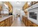 Functional kitchen with vintage cabinets and modern appliances at 3319 Colony Dr, Conyers, GA 30013