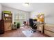Bright home office with a large window, built-in shelving, and a comfortable executive chair at 3319 Colony Dr, Conyers, GA 30013
