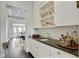 Butlers pantry with sink and counter space at 200 Edinburgh Ln, Woodstock, GA 30188