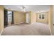 Bedroom with neutral walls, carpet, and two windows for natural light at 1105 Fountain Head Ln, Lawrenceville, GA 30043
