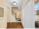 Welcoming foyer with hardwood floors and a staircase leading to the upper level at 1105 Fountain Head Ln, Lawrenceville, GA 30043