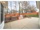 Back patio area featuring an outdoor grill and fire pit, perfect for entertaining at 1105 Fountain Head Ln, Lawrenceville, GA 30043