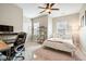 Bedroom featuring a bed, desk, and large window at 3557 Ashcroft Se Dr, Smyrna, GA 30080